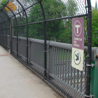 Outdoor directional sign to commuter rail station with commuter rail logo