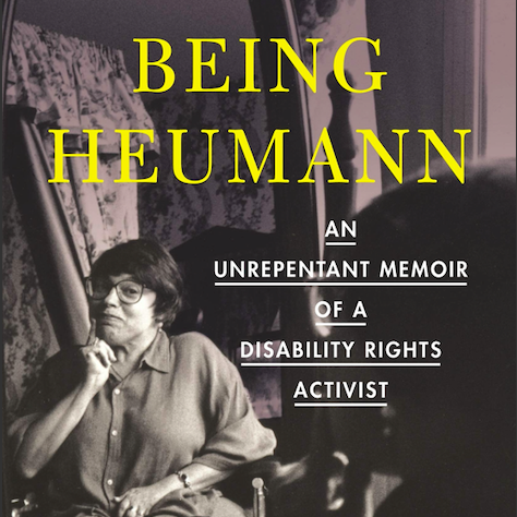 Book Cover of Being Heumann: An Unrepentant Memoir of a Disability Rights Activist shows Judy seated with a smile